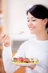 woman eating health food